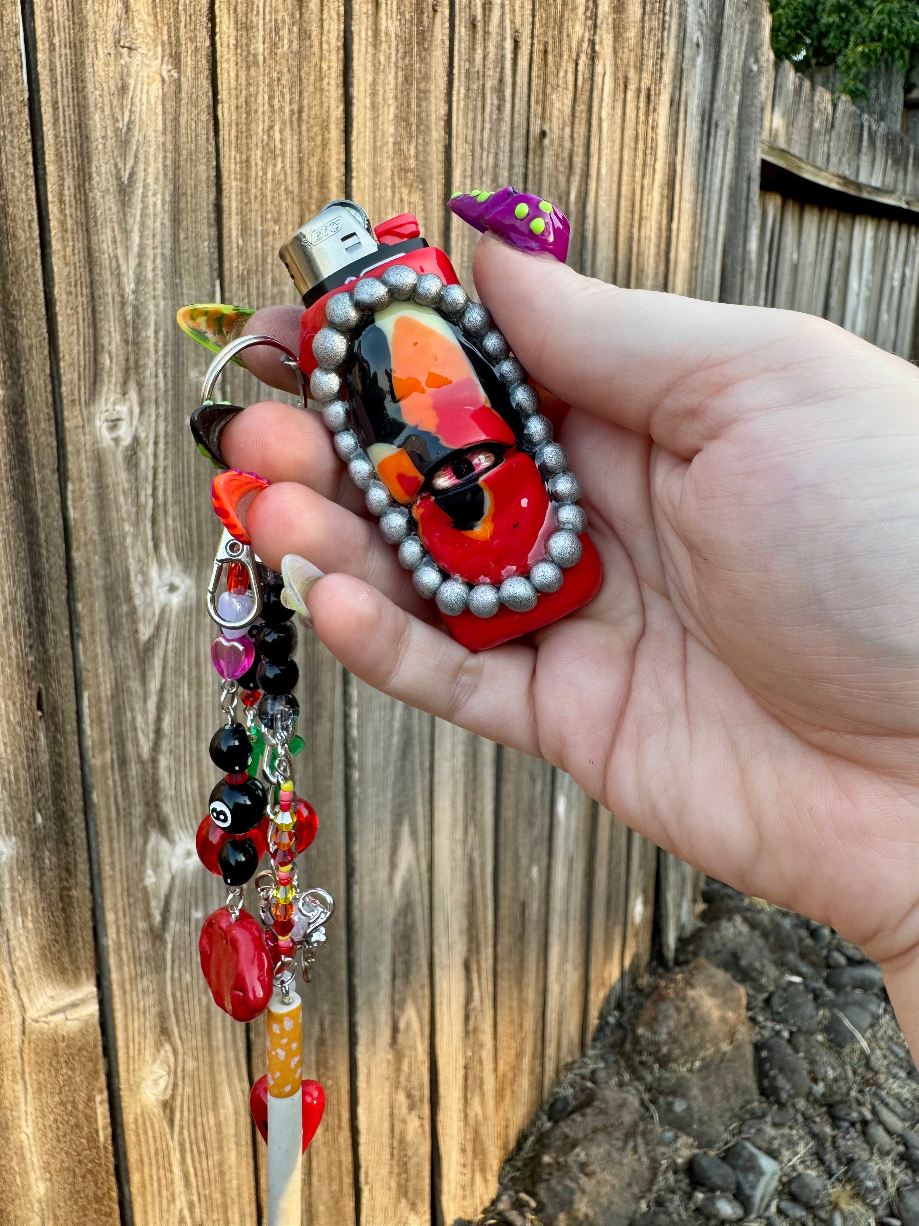 Fuego Eye Lighter Sleeve Bag Charm