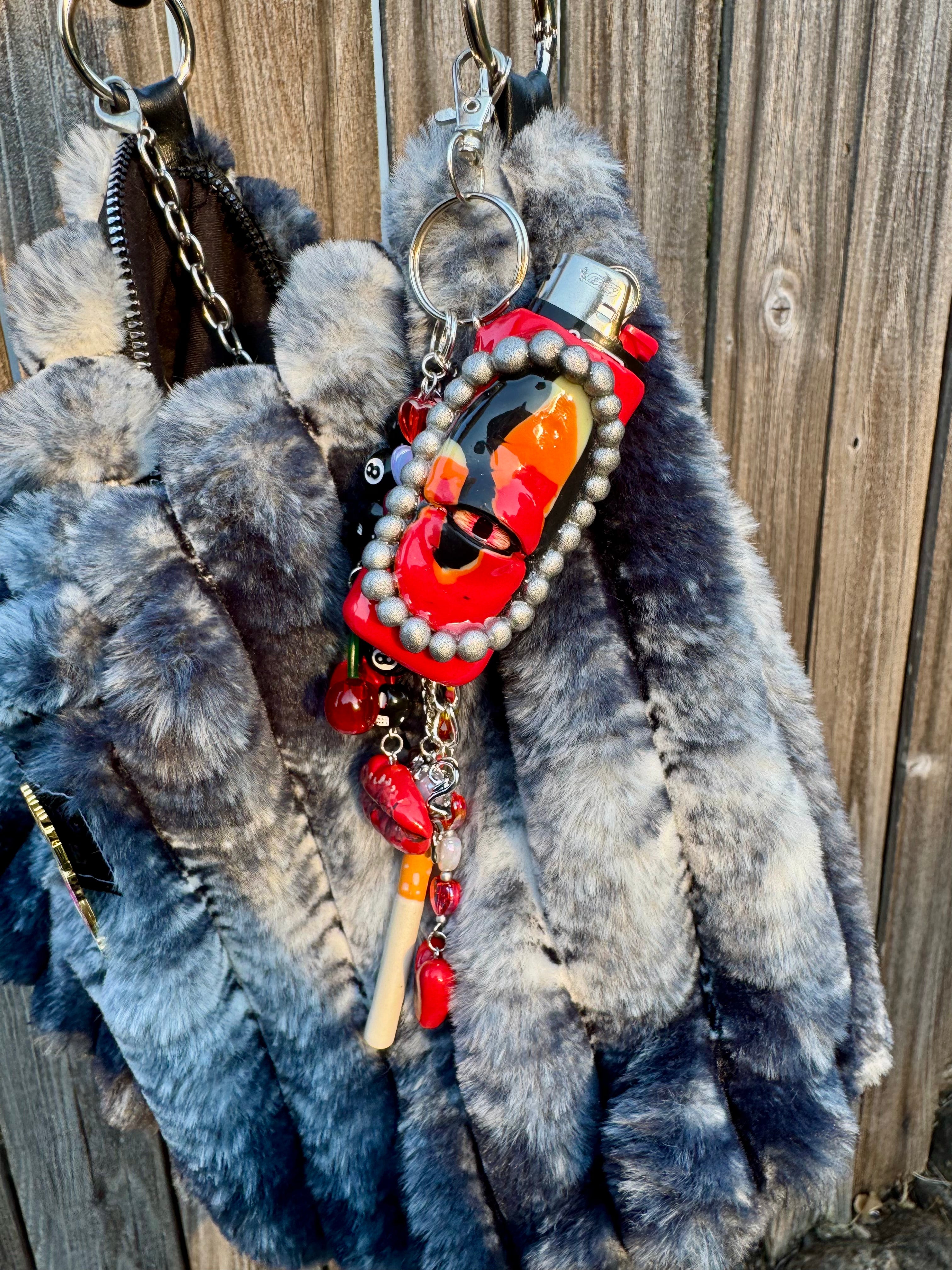 Fuego Eye Lighter Sleeve Bag Charm